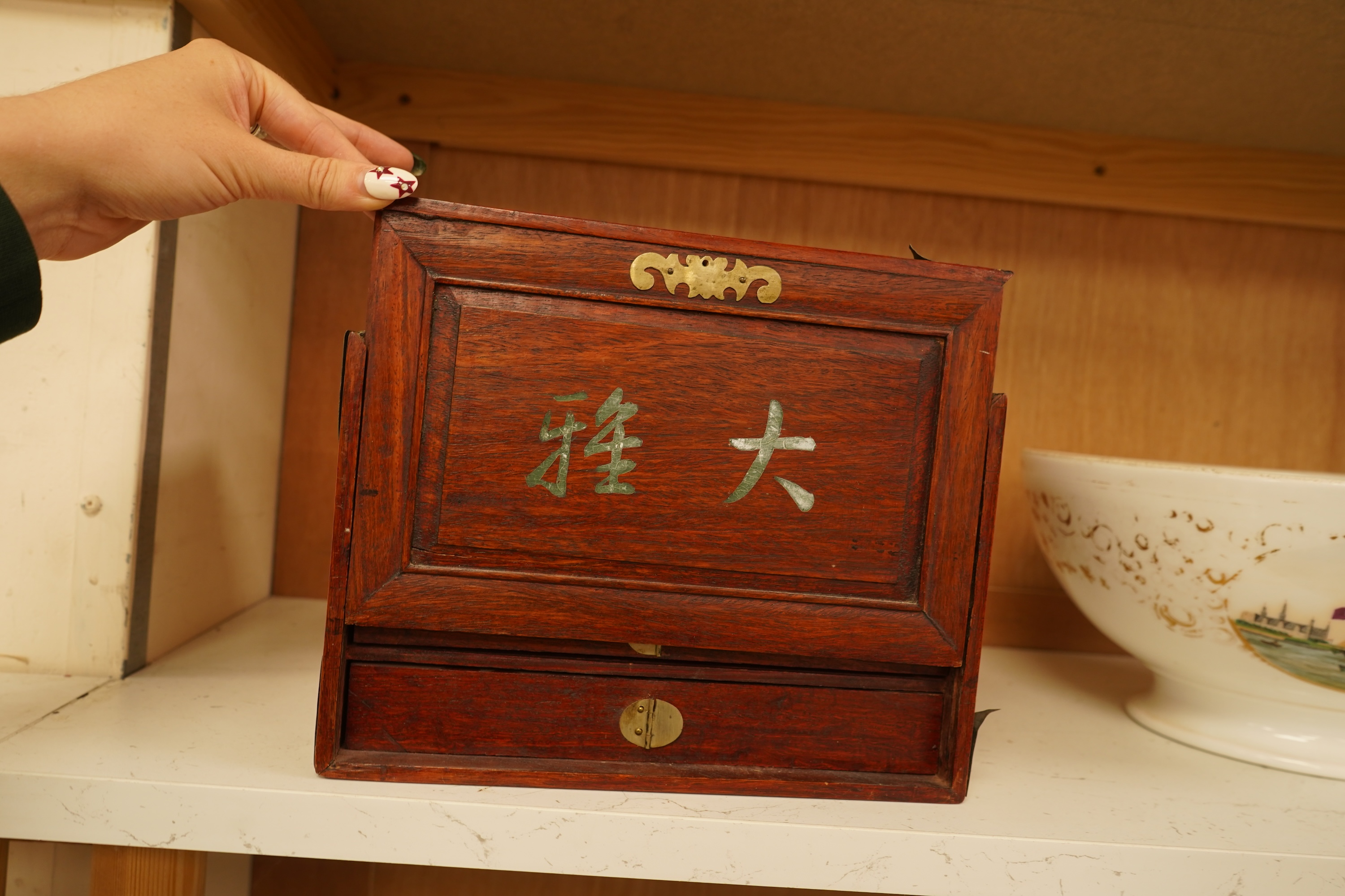A cased Chinese mahjong set, bone pieces